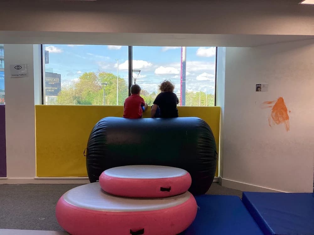 Two children in the NDI sensory play space